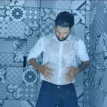 WETColours: Isaak in the Shower with White Shirt and Jeans
