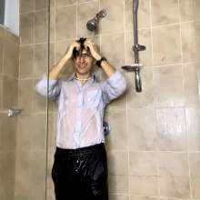 WETColours: Seba in the Shower Dressed