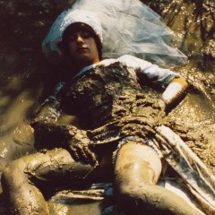 katew: Mandy in the mud in a wedding gown