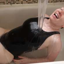 Stella: Stella takes a bath in slippery clear, grey, and black slime.