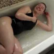Stella: Stella takes a bath in slippery clear, grey, and black slime.