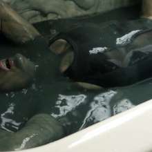 Stella: Stella takes a bath in slippery clear, grey, and black slime.