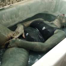 Stella: Stella takes a bath in slippery clear, grey, and black slime.
