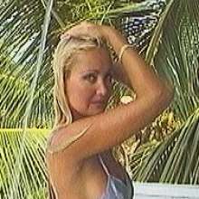 minxmovies: Tracie showers in her nightdress on the balcony and removes her panties