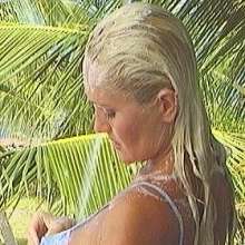 minxmovies: Tracie showers in her nightdress on the balcony and removes her panties