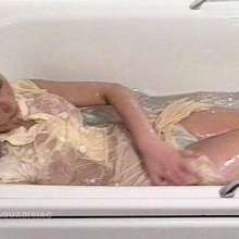 katew: Kate baths in a cream dress