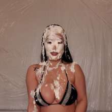 Slimed Models: Asian Babe with Huge Boobs Pies Herself, Takes Her Top Off, sits in a Cake