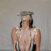 Slimed Models: Asian Babe with Huge Boobs Pies Herself, Takes Her Top Off, sits in a Cake