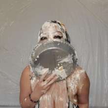 Slimed Models: Asian Babe with Huge Boobs Pies Herself, Takes Her Top Off, sits in a Cake