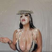 Slimed Models: Asian Babe with Huge Boobs Pies Herself, Takes Her Top Off, sits in a Cake