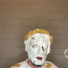 RubberPie: Man in Suit Gets Covered in Mess