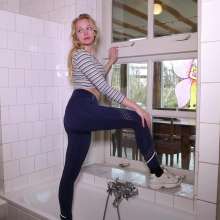 WetPlace: Beautiful Eileen Taking Shower In Blue Leggings