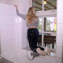 WetPlace: Beautiful Eileen Taking Shower In Blue Leggings