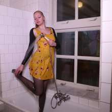 WetPlace: Beautiful Eileen Taking Shower In Yellow Dress