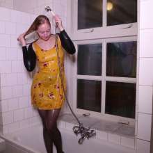WetPlace: Beautiful Eileen Taking Shower In Yellow Dress
