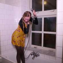 WetPlace: Beautiful Eileen Taking Shower In Yellow Dress