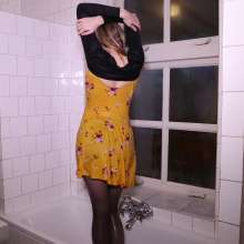 WetPlace: Beautiful Eileen Taking Shower In Yellow Dress