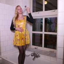 WetPlace: Beautiful Eileen Taking Shower In Yellow Dress