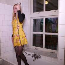 WetPlace: Beautiful Eileen Taking Shower In Yellow Dress