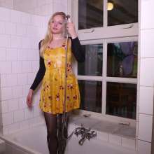 WetPlace: Beautiful Eileen Taking Shower In Yellow Dress
