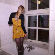 WetPlace: Beautiful Eileen Taking Shower In Yellow Dress