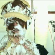 XXXMESS: Woman gets pies in her face in a garage