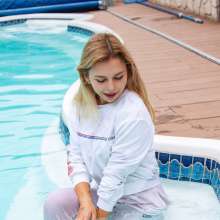 wet.look.me: Stunning Sharon gets completely wet in white sports suit | Wetlook.biz