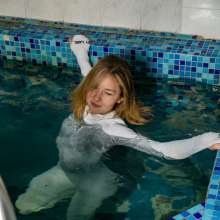 wet.look.me: Wetlook girl in tight tracksuit gets wet in the pool | Wetlook.biz