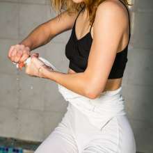 wet.look.me: Wetlook girl in tight tracksuit gets wet in the pool | Wetlook.biz