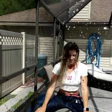 Tight and Wet Clothes: A Soaking Wearing Skinny Jeans and White Shirt