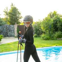 wet.look.me: Wetlook girl in ski suit gets wet in pool | Wetlook.biz