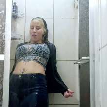 wet.look.me: Wetlook girl in leather jacket and jeans gets wet in shower