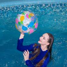 Wet Live Team: All Wet in the Pool Dressed in a Chic Blue Tracksuit