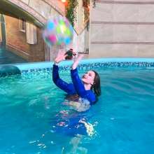 Wet Live Team: All Wet in the Pool Dressed in a Chic Blue Tracksuit