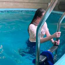 Wet Live Team: All Wet in the Pool Dressed in a Chic Blue Tracksuit