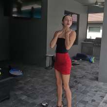 WetlookFashion: Kilo Takes a Dip in Her Sexy Red Mini Skirt and Black Top