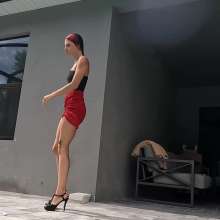 WetlookFashion: Kilo Takes a Dip in Her Sexy Red Mini Skirt and Black Top