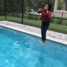WetlookFashion: Natalie Swims in a Red and Black Business Outfit