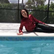 WetlookFashion: Natalie Swims in a Red and Black Business Outfit