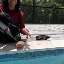WetlookFashion: Natalie Swims in a Red and Black Business Outfit