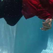WetlookFashion: Natalie Swims in a Red and Black Business Outfit