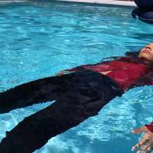 WetlookFashion: Natalie Swims in a Red and Black Business Outfit