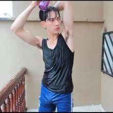 WETColours: Buckets of Water in a Black Tank Top
