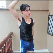 WETColours: Buckets of Water in a Black Tank Top
