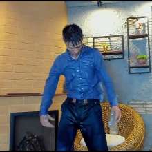 WETColours: Nico Gets Wet Dressed in a Blue Shirt and Jeans