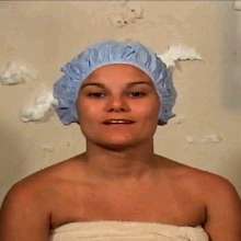 Anglefan: Kristen slimed in her towel and shower cap