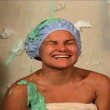 Anglefan: Kristen slimed in her towel and shower cap