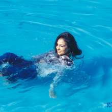 wet.look.me: Appetizing girl Julia is swimming in the pool in clothes!