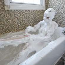 Stella: Stella covers herself in 5 cans of shaving foam.