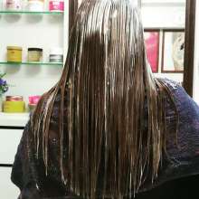 ArabianGoggles: Oil combed through hair.